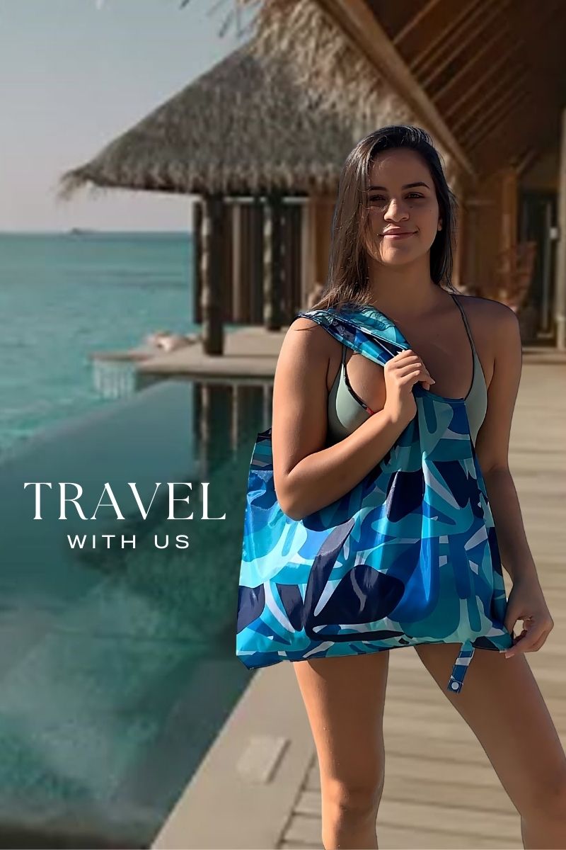 blue reef bag held by model